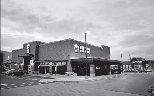  ?? E. JASON WAMBSGANS/CHICAGO TRIBUNE ?? Several employees were fired from a Buffalo Wild Wings in Naperville after some customers said they were asked to move to another table because of their skin color.