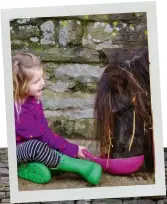  ??  ?? Shear fun: Amanda’s nine children live a wonderfull­y wild life out at Ravenseat Farm