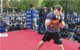  ??  ?? All pumped up: Australian boxer Jeff Horn training in front of the public in a mall in Brisbane yesterday. – AP