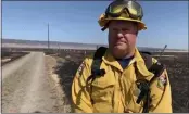  ?? RICK SILVA — ENTERPRISE-RECORD ?? Rick Carhart of Cal Fire Butte County tells the Enterprise­Record the Gunnison Fire began around 1:45 p.m. and by 4 p.m. was nearing 350acres, north of Chico.