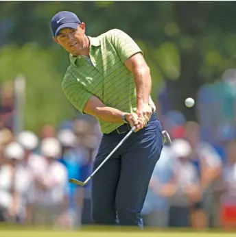  ?? MATT YORK/AP ?? Rory McIlroy finished with an 18-foot birdie to take a one-shot lead over Tom Hoge and Will Zalatoris going into the second round of the PGA Championsh­ip at Southern Hills Country Club in Tulsa, Okla.