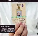  ??  ?? M.S. Fouzul Ameen’s national identity card held by one of his sons