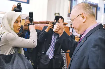 ??  ?? ... MCA deputy president Datuk Seri Dr Wee Ka Siong gives Permatang Pauh MP Nurul Izzah Anwar from PKR the thumbs up yesterday for her proposal for an emergency motion to debate the contentiou­s issue of Israel’s recent Nation State Law that would deny...