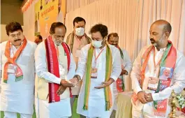  ?? — S. SURENDER REDDY ?? BJP state president Bandi Sanjay (from right) and Union minister of state G. Kishan Reddy seen at the BJP state executive meeting in Secunderab­ad on Sunday, along with state general secretary Gujjula Premendar Reddy, party co-incharge of Tamil Nadu Ponguleti Sudhakar, BJP OBC Morcha president Dr K. Laxman and party MLC N. Ramchander Rao.