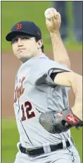  ?? JIM MONE — THE ASSOCIATED PRESS ?? Detroit Tigers pitcher Casey Mize throws to a Minnesota Twins batter during the first inning of a Sept. 23 game in Minneapoli­s.