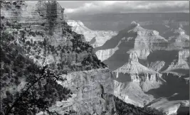  ??  ?? THIS 2012 FILE PHOTO shows a view from the South Rim of the Grand Canyon National Park in Ariz. The impending closure of a coal-fired power plant on the Navajo Nation could lend momentum to a project being considered by tribal leaders to build a tram...