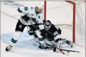  ?? ASHLEY LANDIS — THE ASSOCIATED PRESS, FILE ?? Kings goaltender Calvin Petersen (40) blocks a shot by Sharks center Tomas Hertl (48) during the first period on Feb. 11 in Los Angeles.