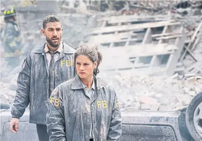  ?? MICHAEL PARMELEE CORUS ?? Special Agent Maggie Bell (Missy Peregrym) and her partner, Special Agent Omar Adom ‘OA’ Zidan (Zeeko Zaki), star in FBI.