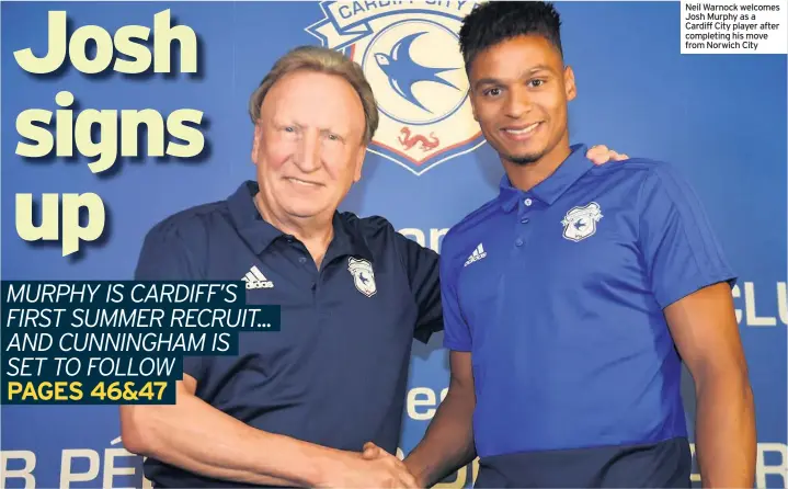  ??  ?? Neil Warnock welcomes Josh Murphy as a Cardiff City player after completing his move from Norwich City
