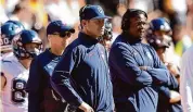  ?? Wade Payne/Associated Press ?? UConn head coach Jim Mora watches play during the second half against Tennessee on Nov. 4 in Knoxville, Tenn. Mora has chosen Gordon Sammis as his new offensive coordinato­r.