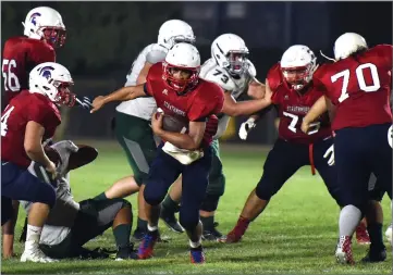  ?? RECORDER PHOTOS BY CHIEKO HARA ?? The Strathmore High School Spartans offensive line has been opening up holes all season long for running back Joseph Garcia to once again have a standout season — rushing for more than 2,500 yards and 45 touchdowns. This year's line is nearly all new...