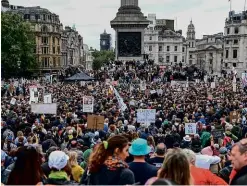  ??  ?? ABOVE: Crowds in Trafalgar Square for the 'Unite for Freedom' protest on 29 August.