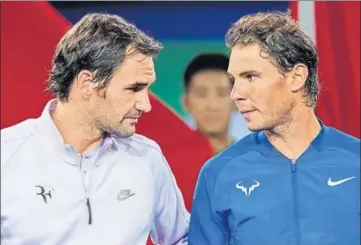  ?? AFP ?? Roger Federer’s decision to pull out of the Paris Masters to ‘protect a back problem’ has put Rafael Nadal (right) on the verge of ending the year as No 1 if he wins his opening round match in Paris.