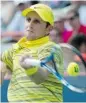  ?? PAUL CHIASSON /THE CANADIAN PRESS ?? Canada’s Jesse Levine returns to Rafael Nadal during second-round play at the Rogers Cup Wednesday.