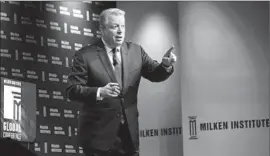  ?? Frederic J. Brown AFP/ Getty I mages ?? TECHNOLOGY MAY lead to many more job losses in the f inance industry. Above, Al Gore speaks at the Milken Institute Global Conference.