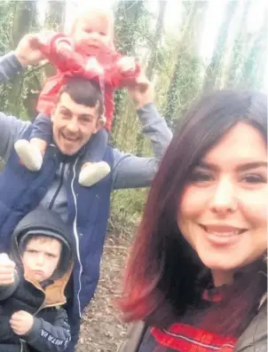  ??  ?? FC Carmarthen captain Paul Rees, who died aged 28, with his partner Amy Skinner and children Riley Jay and Daisy Joy.