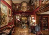  ??  ?? Guillermo del Toro keeps his collection of art, books and ephemera at Bleak House in Los Angeles.