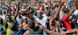  ??  ?? People march against Burkina Faso President’s plan to change the constituti­on to stay in power (REUTERS)