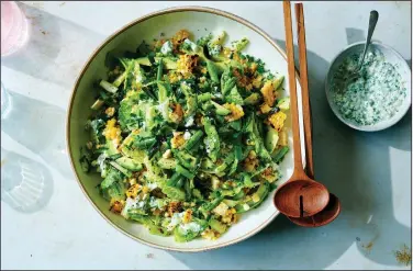  ??  ?? Sue Li’s Grilled Corn and Avocado Salad With Feta Dressing (The New York Times/David Malosh)