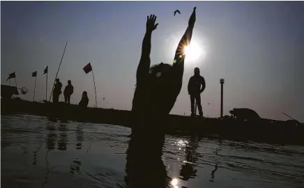  ?? Rajesh Kumar Singh / Associated Press ?? The Ganges River, a Hindu holy site, is riddled with pollution, including 1.2 billion pounds of plastics.