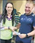  ?? ?? Patricia Ryan presenting Michael Gleeson of Templemore with his prize at the 4-Mile last Friday.