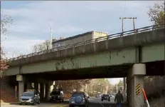  ?? Julia Malakie / lowell sun ?? the two bridges where interstate 495 northbound and southbound cross over andover street in tewksbury are on a national list of bridges in poor condition.