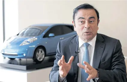  ?? REUTERS ?? Carlos Ghosn, chairman and CEO of Nissan Motor Co, gestures during an interview with Reuters at the company’s global headquarte­rs in Yokohama yesterday.
