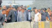  ?? HT ?? Union minister for road transport and highways Nitin Gadkari, UP deputy chief minister Keshav Prasad Maurya and union minister General V K Singh inspect the constructi­on work on National Highway 9 at Chipiyana railway overbridge, DelhiMeeru­t Expressway in Ghaziabad on Thursday.