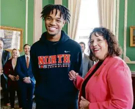  ?? RICK CINCLAIR/WORCESTER TELEGRAM & GAZETTE VIA ASSOCIATED PRESS ?? Carl-Hens Beliard, a basketball star at North High School in Worcester before playing for Salem State, met Lieutenant Governor Kim Driscoll at a tour of the State House in April.