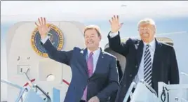  ?? AP ?? US President Donald Trump arrives with Nevada Senator Dean Heller, on Air Force One, at the Elko Regional Airport, on Saturday.