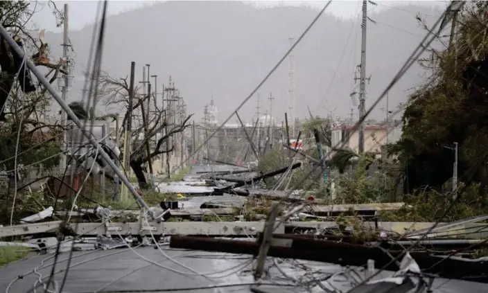  ?? Photograph: Carlos Giusti/AP ?? Humacao, Puerto Rico, on 20 September 2017 after Hurricane Maria hit.