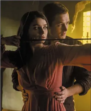  ??  ?? Eve Hewson and Taron Egerton as Maid Marian and Robin Hood in RobinHood