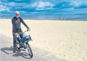  ?? ?? ● Lulworth Cove, main, Durdle Door, above; and writer Peter Samson on his bike, left, and visiting Old Harry Rocks, far left