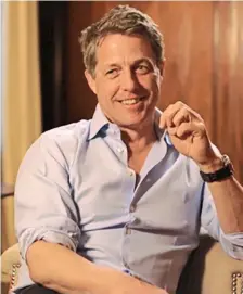  ??  ?? Love is in the air Hugh Grant features