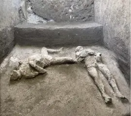  ?? Parco Archeologi­co di Pompei via AP ?? The casts of what are believed to have been a rich man and his male slave fleeing the volcanic eruption of Vesuvius nearly 2,000 years ago were discovered during recent excavation­s.