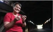  ?? BILL UHRICH — MEDIANEWS GROUP ?? Dr. Karen Campbell of Albright College examines a little brown bat that roosts in Wertz’s Red Bridge at the Berks County Heritage Center. Campell will present a program on the bats at the bridge at 7 p.m. Thursday.