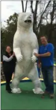  ?? PEG DEGRASSA — DFM ?? Managing partners Pam Mariani and Brian Robinson stand beside the giant polar bear on the newly opened “Valley View Zoo Mini Golf” at Valley View Golf, 4600 West Chester Pike, Newtown Square. Cost to play is only $5 for children and $8 for adults. The course also hosts birthday parties, group outings for schools, scouts and clubs, and team building corporate events. For more informatio­n, call 610-3561810.