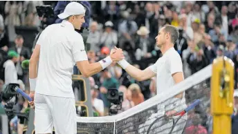  ?? Photo / AP ?? Andy Murray, right, couldn’t rein in the booming serves from 37-year-old John Isner.