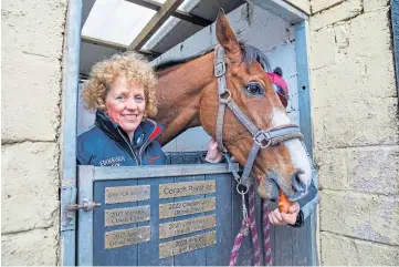  ?? ?? WINNER: Trainer Lucinda Russell with Corach Rambler. Picture by Kenny Smith.