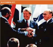  ?? AP ?? US President Jimmy Carter with Egypt’s Anwar Sadat and Israel’s Menachem Begin.