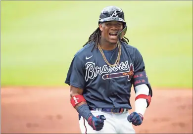  ?? AP-John Bazemore ?? Atlanta Braves center fielder Ronald Acuna Jr. reacts after popping out to second baseman Ozzie Albies during a practice game.