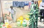  ??  ?? A health worker navigates a corona model to sanitise the hotspot and containmen­t zone in Chennai. —ANI