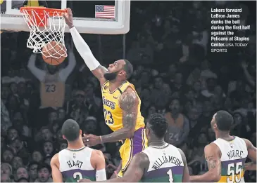  ?? USA TODAY SPORTS ?? Lakers forward LeBron James dunks the ball during the first half against the Pelicans at Staples Center.