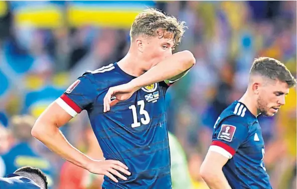  ?? ?? Jack Hendry and Ryan Christie feel the pain after defeat by Ukraine at Hampden ended Scotland’s dream of making the World Cup finals.