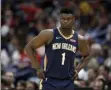  ?? THE ASSOCIATED PRESS ?? In this March 6, 2020, file photo, New Orleans Pelicans forward Zion Williamson walks onto the court during the second half of the team’s NBA basketball game against the Miami Heat in New Orleans.