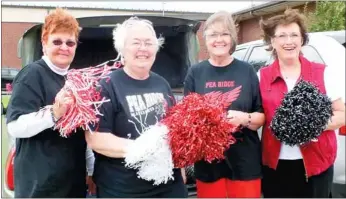  ?? TIMES photograph by Annette Beard ?? Three of the four Homecoming maids and the queen from 1963 — Ann Foster Harris, Jane McKinney Cooley, Barbara Patterson Owen and Sue Walker Ruddick — rode in the 2013 Homecoming Parade 50 years after the first Blackhawk football Homecoming parade. One...