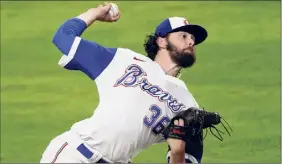  ?? John Bazemore / Associated Press ?? Braves starting pitcher Ian Anderson pitches against the Phillies on Saturday. The Shenendeho­wa graduate gave up four runs in 5 1⁄3 innings.