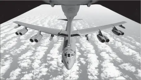  ?? Jockel Finck Associated Press ?? THE AIR FORCE plans for the B-52 to f ly until 2050. Originally deployed as a long-range, high-altitude nuclear bomber, it became a carpet-bombing specialist in Vietnam. These days, it’s routinely used as air support for U.S. ground troops in the...