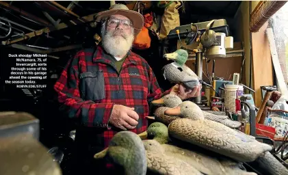  ?? ROBYN EDIE/STUFF ?? Duck shooter Michael McNamara, 75, of Invercargi­ll, sorts through some of his decoys in his garage ahead the opening of the season today.