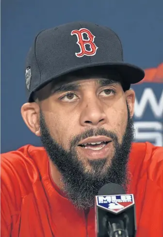  ?? STAFF PHOTO BY CHRISTOPHE­R EVANS ?? ON THE SPOT: David Price, who will start Game 2 of the World Series tonight, meets the press before last night’s Game 1 at Fenway.